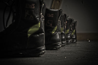 Firefighter boots arranged on floor