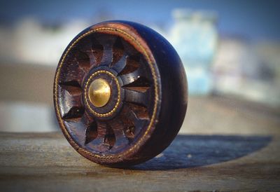 Close-up of rusty metal on table