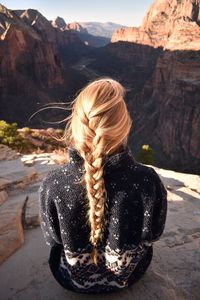 Rear view of woman looking at mountains