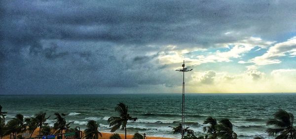 Scenic view of sea against sky at dusk