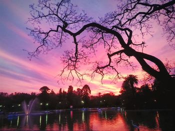 Scenic view of lake at sunset