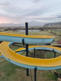 Amusement park ride against sky