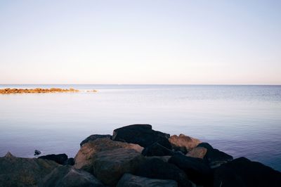 Scenic view of sea against clear sky