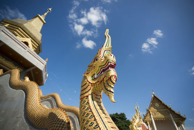 Low angle view of statue against sky