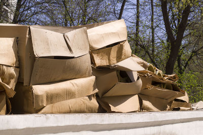 Low angle view of stack on field against sky