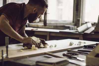 Man working on table