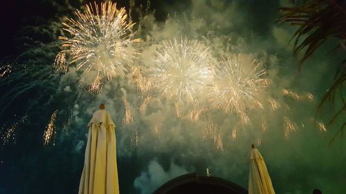 Firework display at night