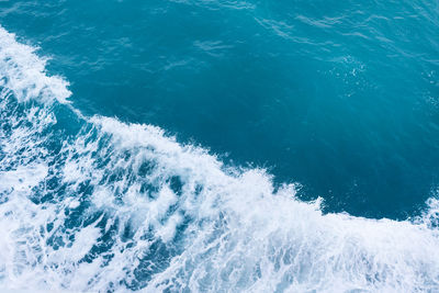 High angle view of water flowing in sea