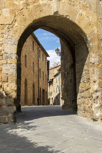 View of alley amidst buildings