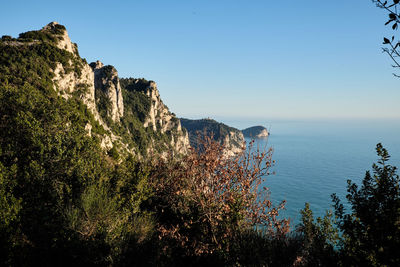 Scenic view of sea against clear blue sky