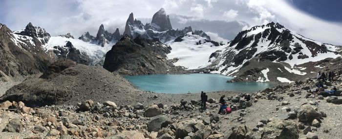 Panoramic view of snowcapped mountains against sky