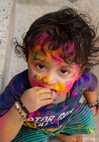 Portrait of cute boy soaked in color