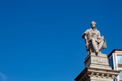 The statue of piazza stesicoro in catania, with the background of cloudless sky