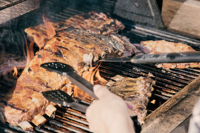 Close-up of meat on barbecue grill