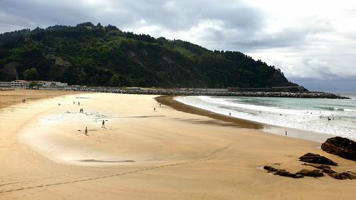 Scenic view of beach against sky