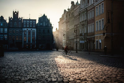 Street against buildings on sunny day