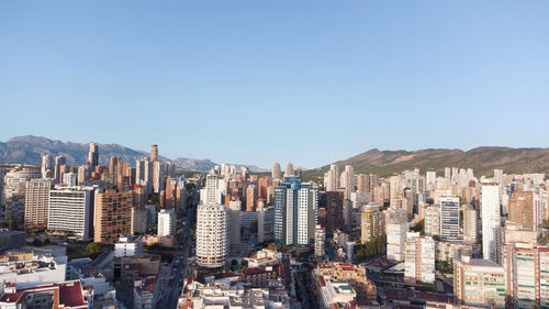 Cityscape against clear sky