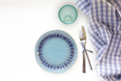 High angle view of food on table against white background