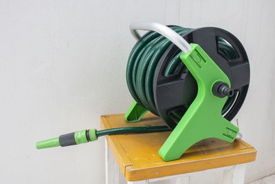 Close-up of multi colored equipment on wall at home