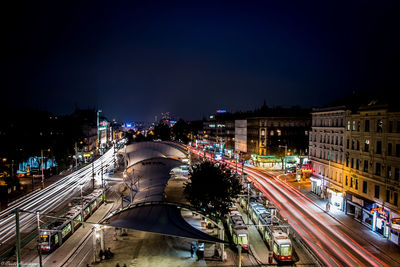 High angle view of light trails on city street at night