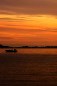 Scenic view of sea at sunset