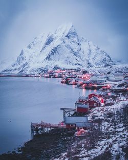 Scenic view of snow covered mountains against sky