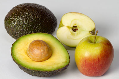 Close-up of fruits against white background