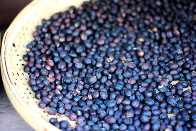 High angle view of blackberries in container on table