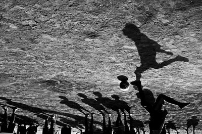 The shadow moment of the penalty kick from the afternoon children's football 