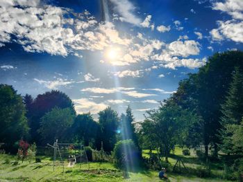 Scenic view of landscape against cloudy sky