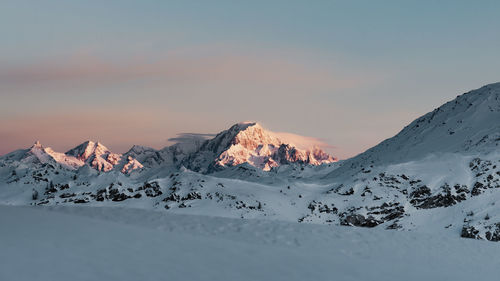 Scenic view of snowcapped mont blanc against sky during sunrise