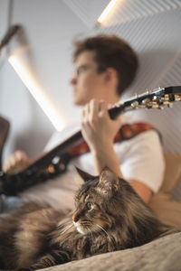 Young woman playing guitar