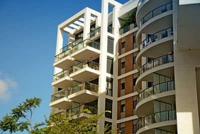 Low angle view of residential building against sky