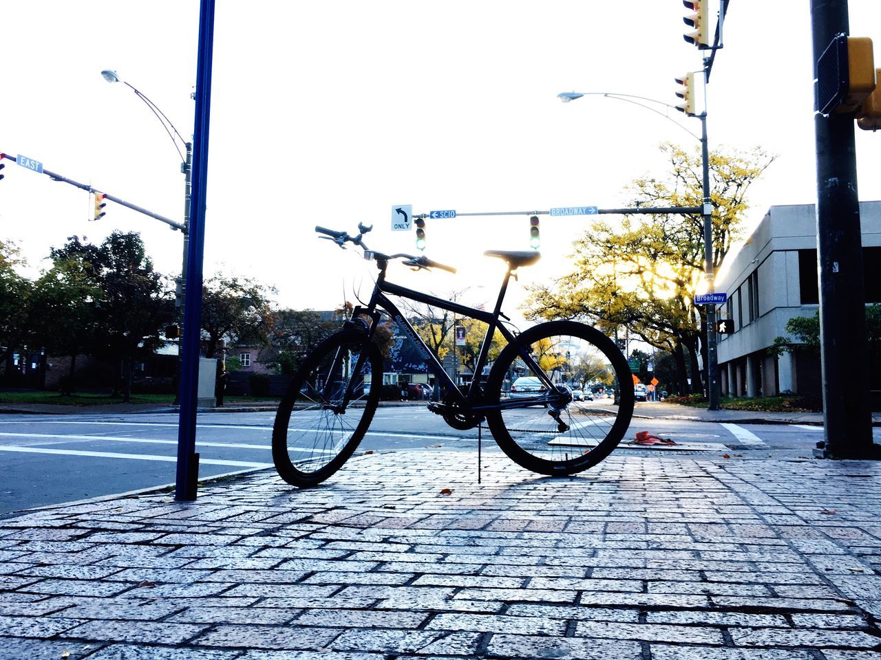 BICYCLE PARKED ON STREET