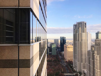 Modern buildings against sky in city