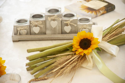 High angle view of bouquet on white table