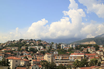 Aerial view of townscape against sky