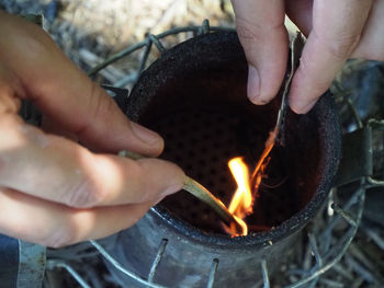 Cropped hand of person preparing food