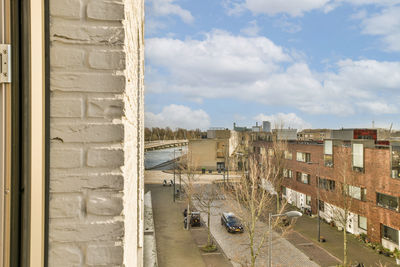 Buildings in city against sky