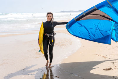 Full length of man standing on beach