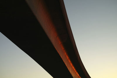 Low angle view of bridge against clear sky