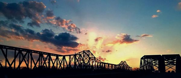 Low angle view of cloudy sky at sunset