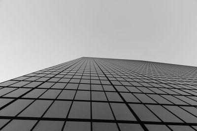 Low angle view of skyscraper against clear sky