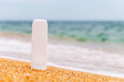 Close-up of dentures on beach