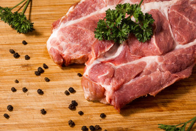 Close-up of meat on cutting board