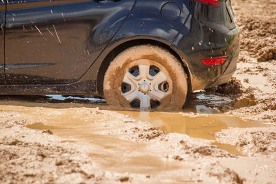 View of tire tracks in sand