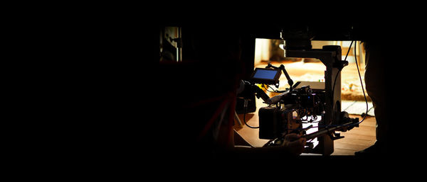 Close-up of fire hydrant on table in dark room