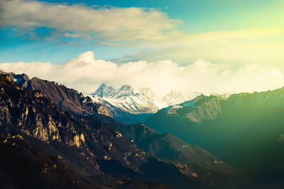 Scenic view of snowcapped mountains against sky