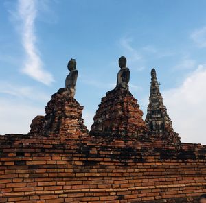 Low angle view of old temple against sky