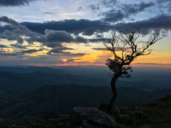 Scenic view of landscape against sky during sunset